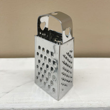 Mini rasp voor amberblokjes - zilverkleurig